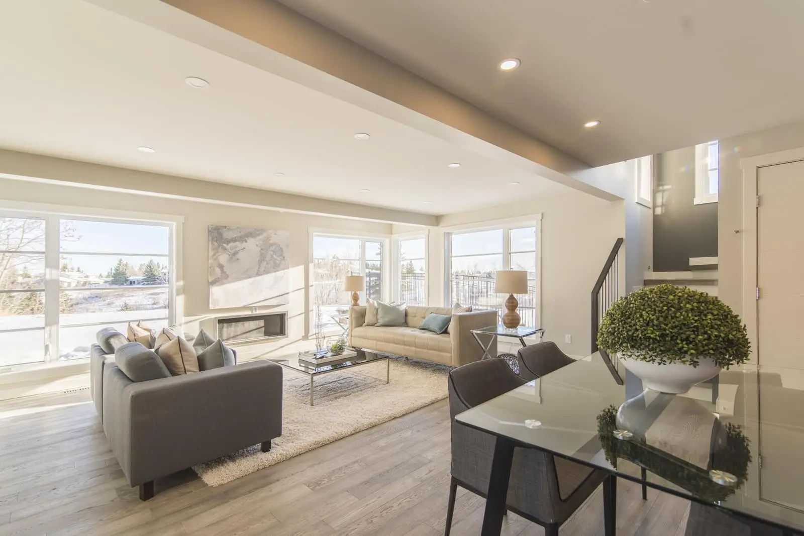 Open-plan living and dining space furnished as a single scheme